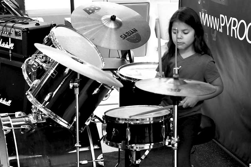 PY Rock student plaing drums